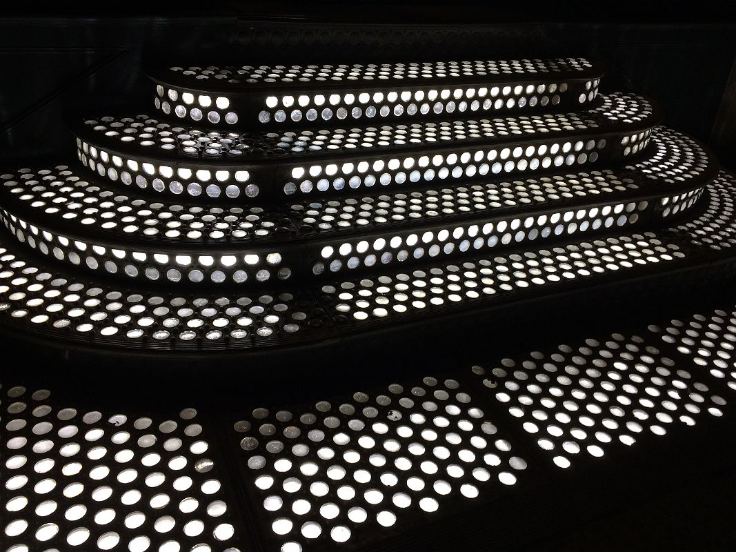 28-3 Light From The Basement Shines Up Through The Fitted Circles Of Glass Of A Hollow Sidewalk In SoHo New York City